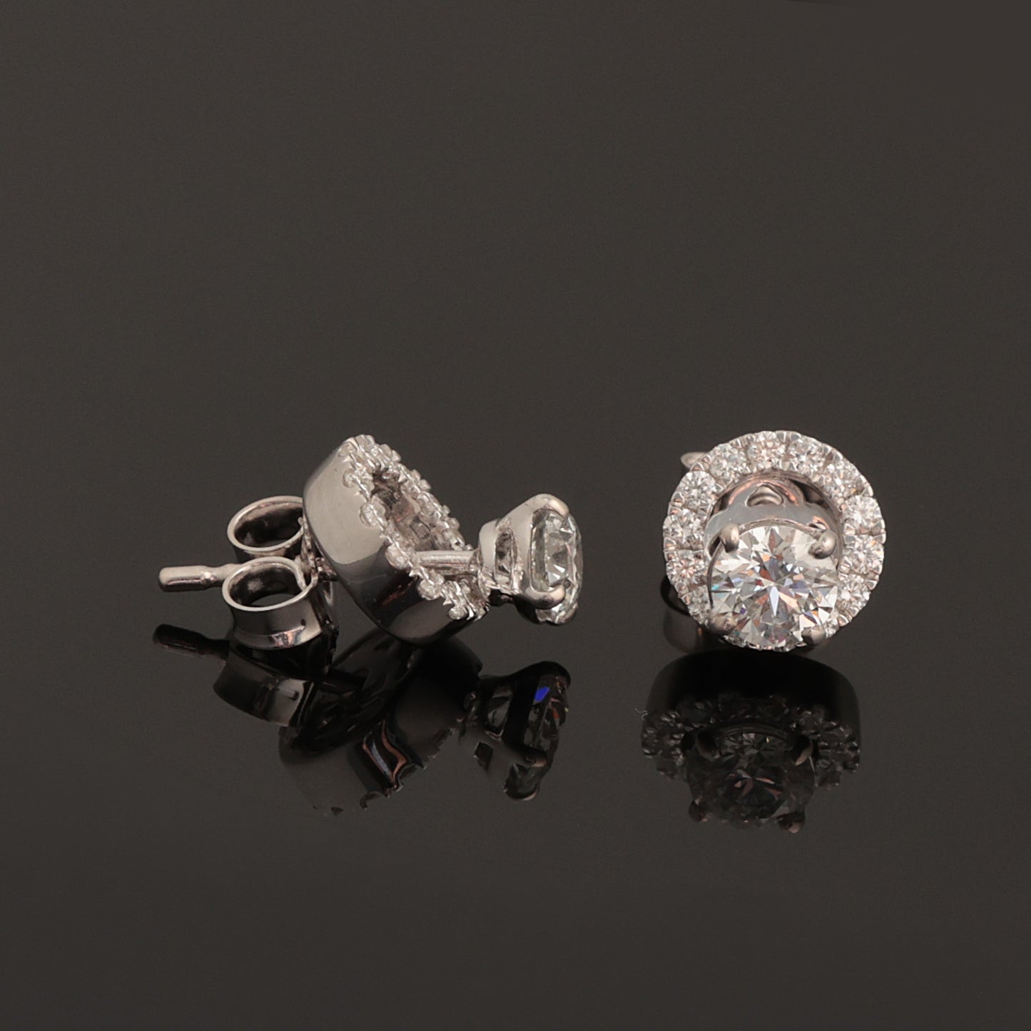 Auskaros ar dimantiem 0.75 ct, baltais zelts 585° (14K)