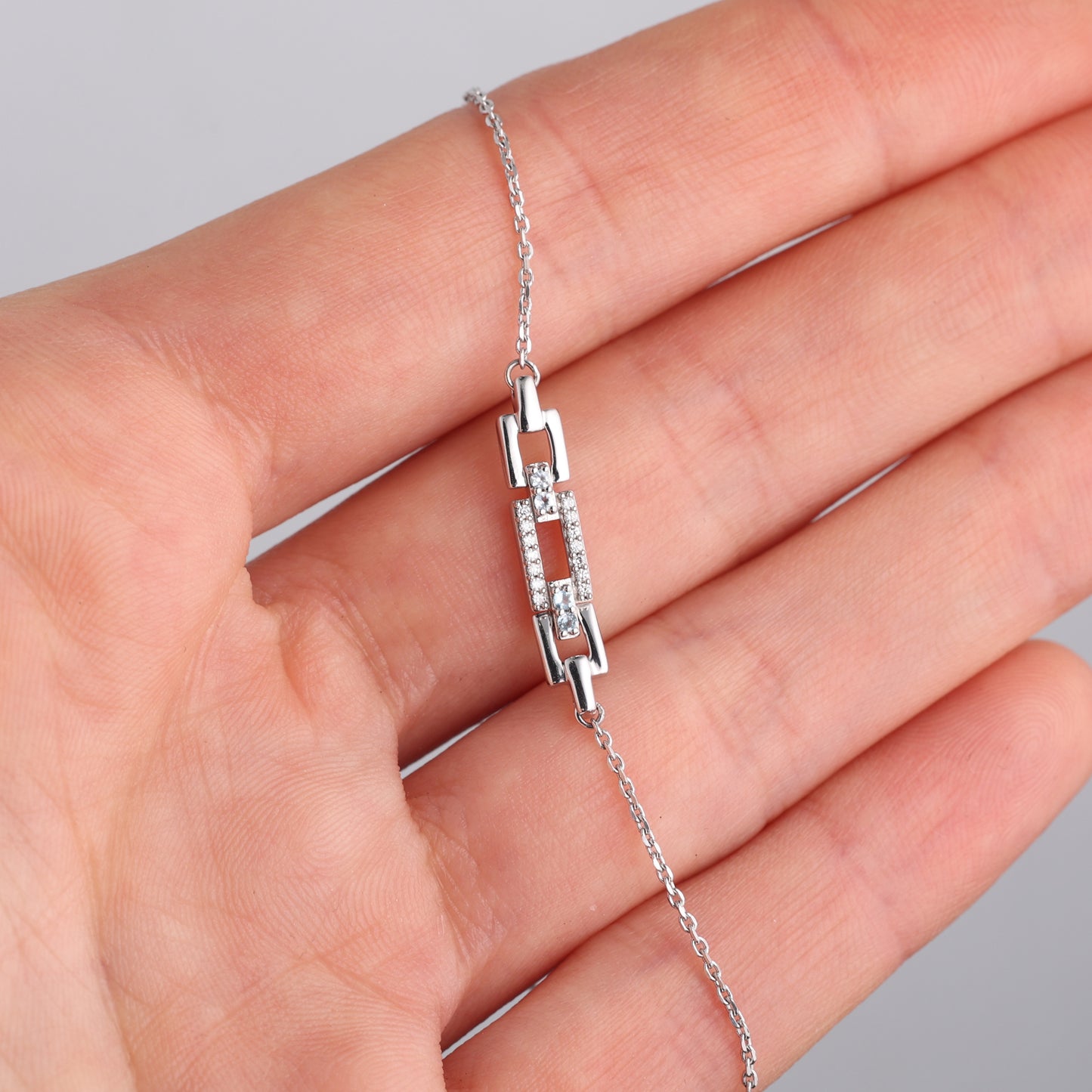 Aproce ar Topāziem 0.04 ct un Dimantiem 0.04 ct, Baltais zelts 750° (18K)