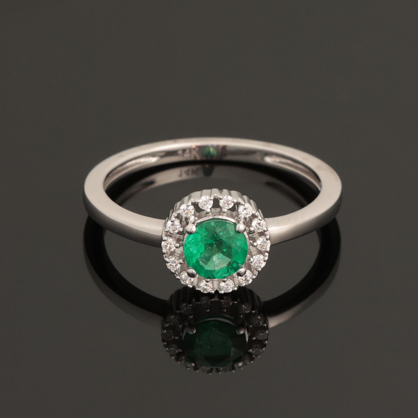 Ring with Emerald 0.45 ct, White Gold 585° (14K)
