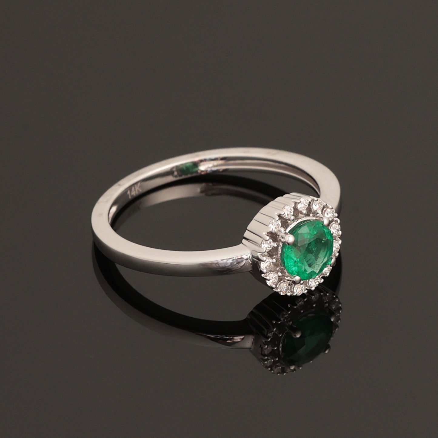 Ring with Emerald 0.45 ct, White Gold 585° (14K)